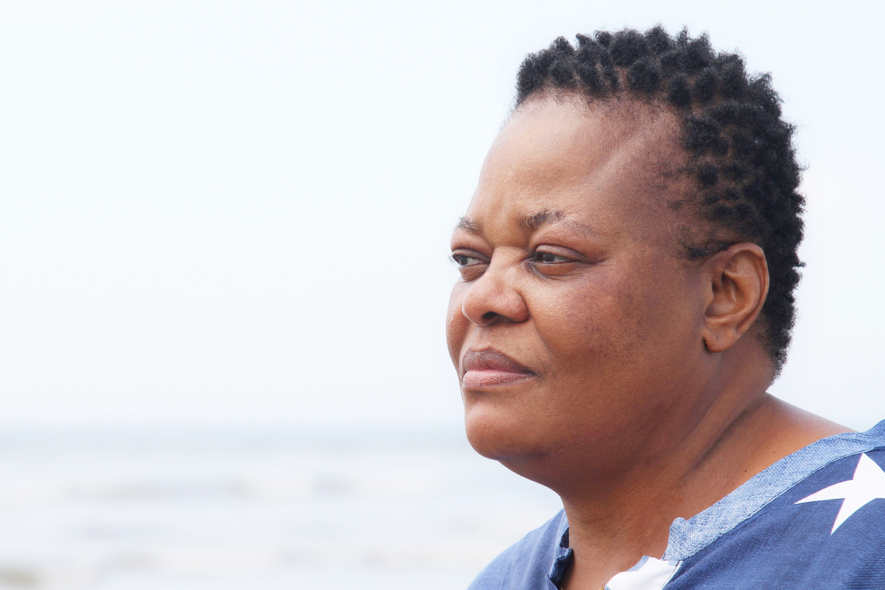 outdoor portrait of serious mature woman of african ethnicity